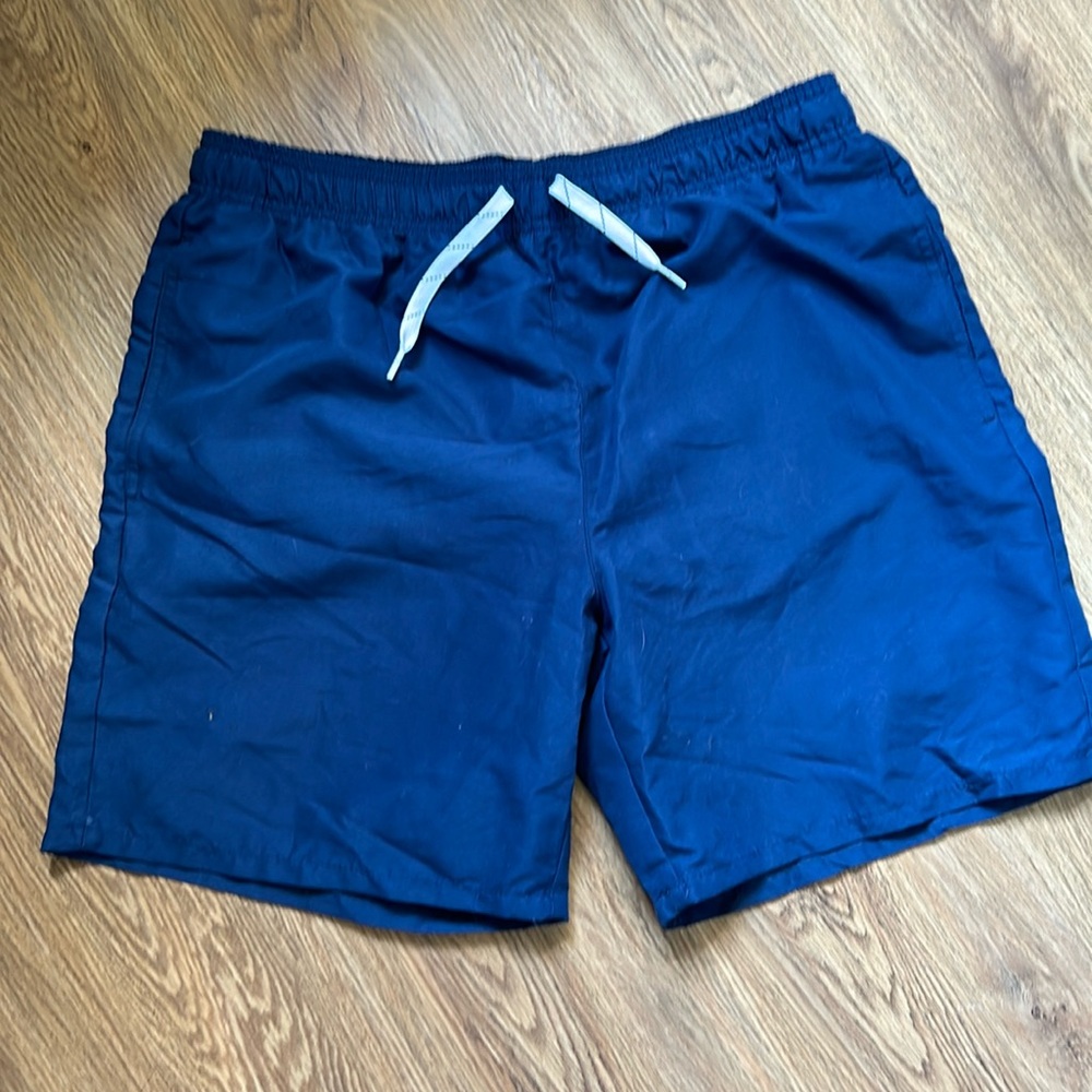 Gently-worn, super-clean men’s navy swim trunks